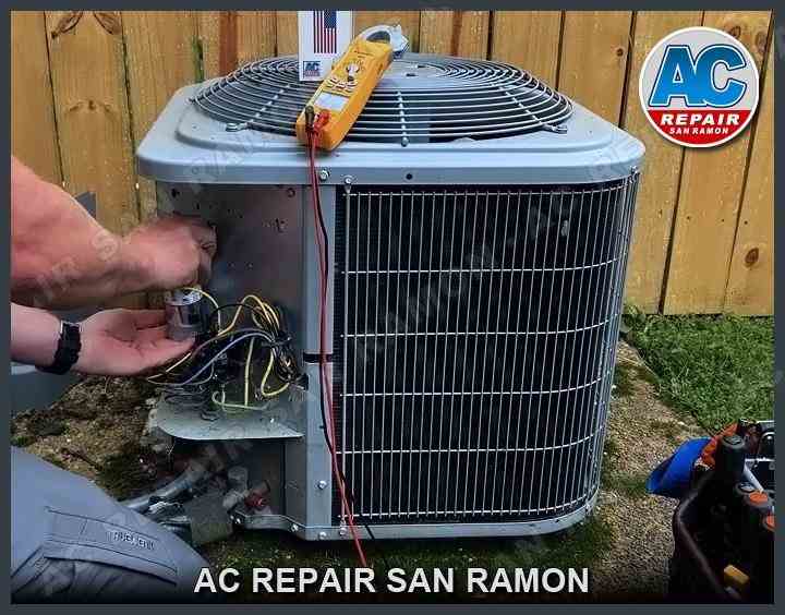 Pat, owner of AC Repair San Ramon, servicing an outdoor air conditioning unit with diagnostic tools